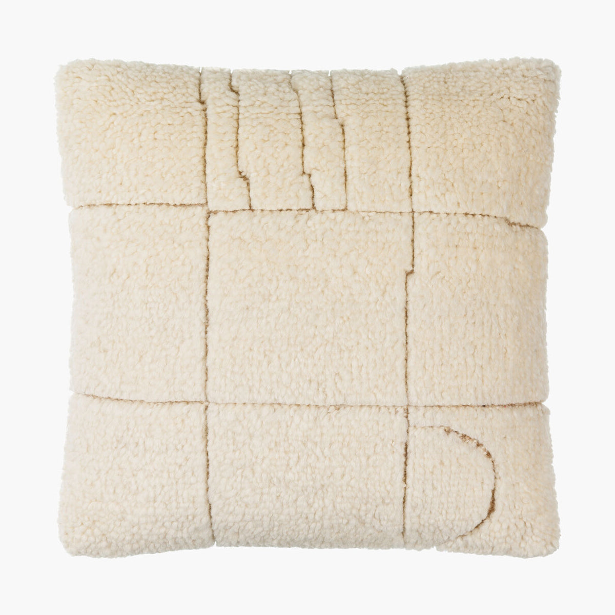 Beige quilted pillow on a white background