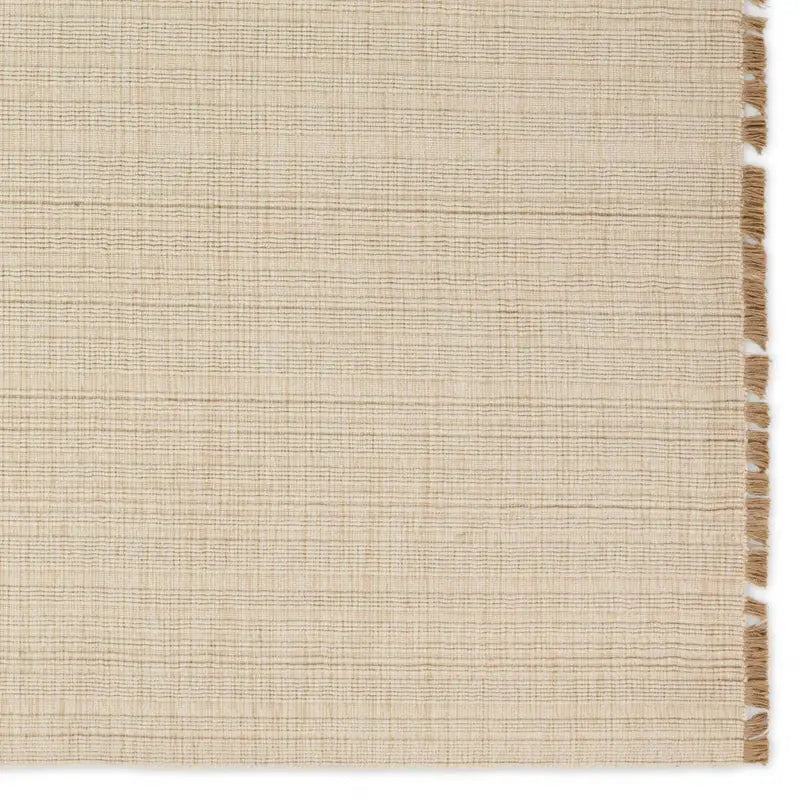 Beige woven mat with a striped border
