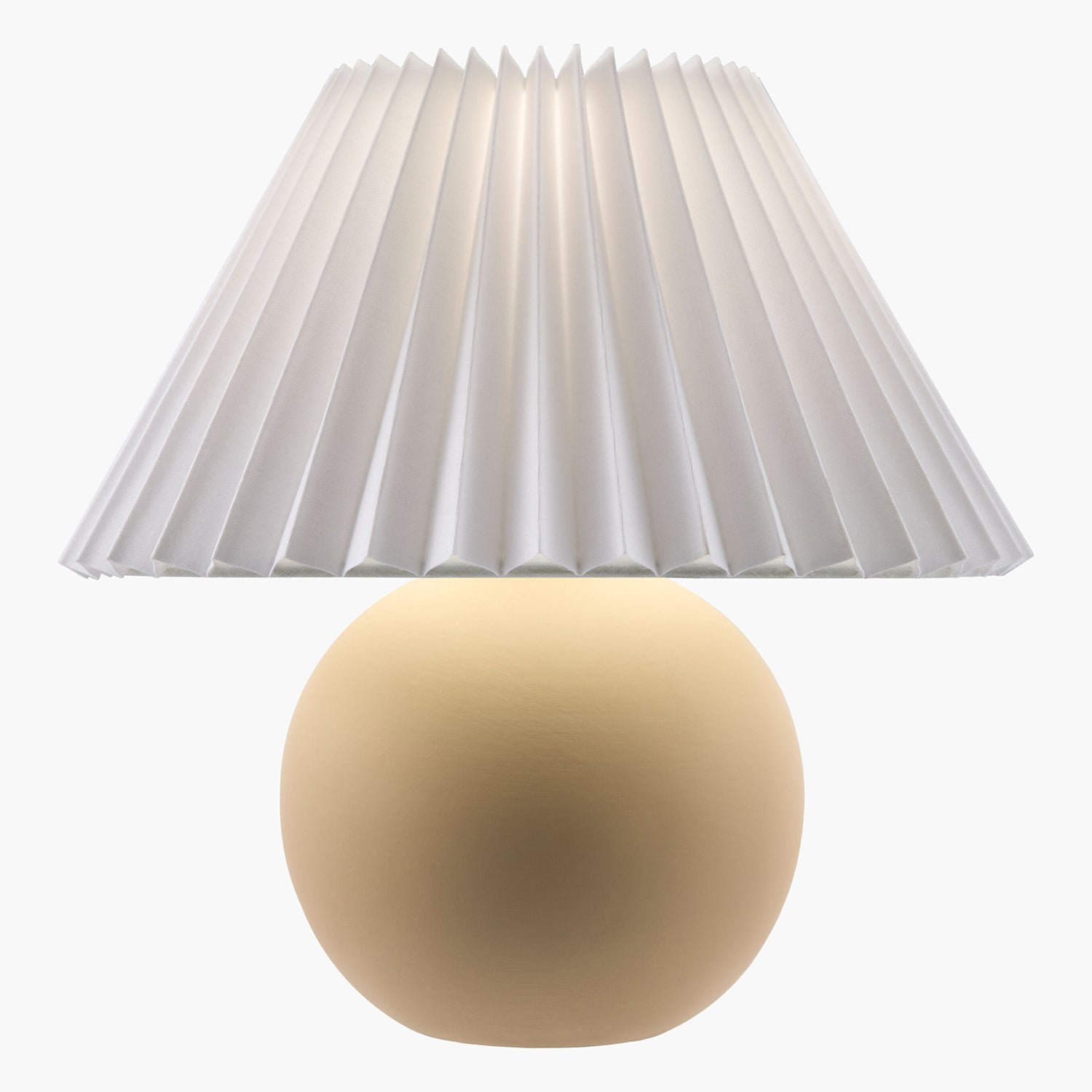 Lamp with pleated white shade and beige base on a white background