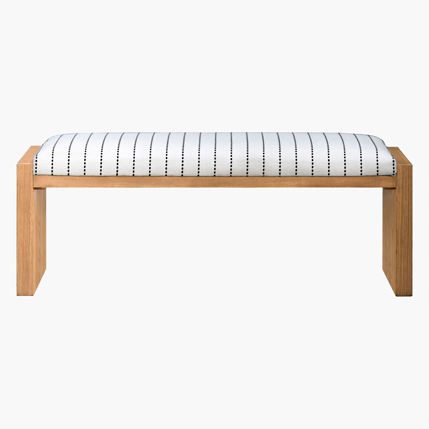 Wooden bench with a white striped cushion featuring black dots on a white background