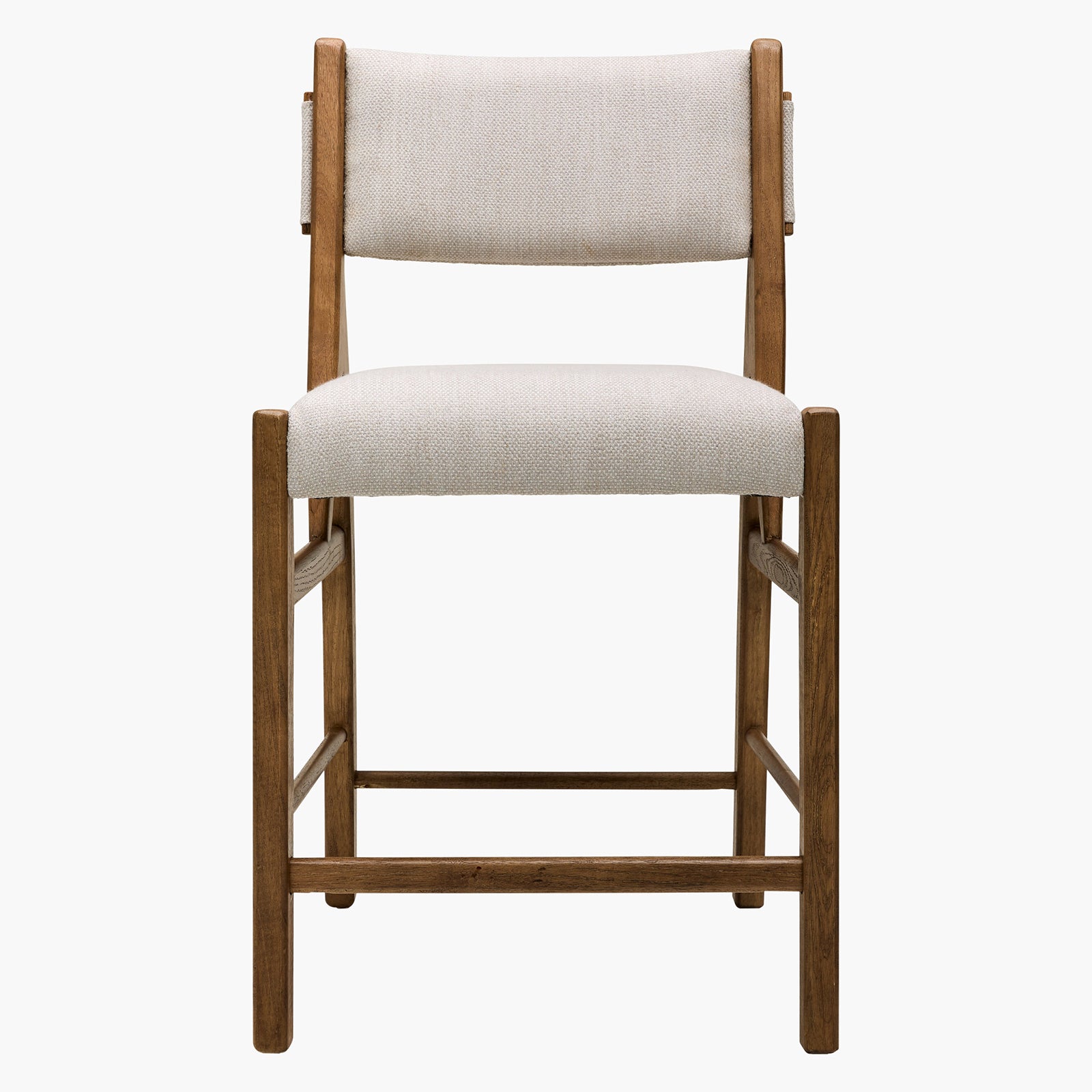 Wooden bar stool with white cushioned seat and backrest on a white background