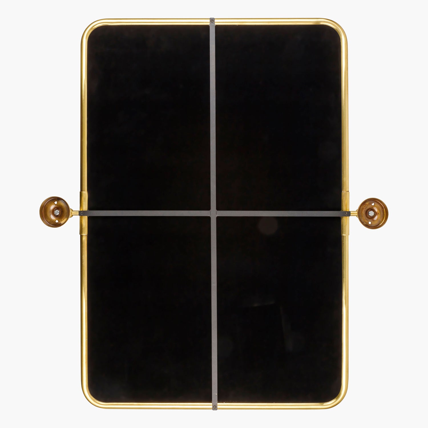 Black rectangular object with gold frame and decorative elements on a white background