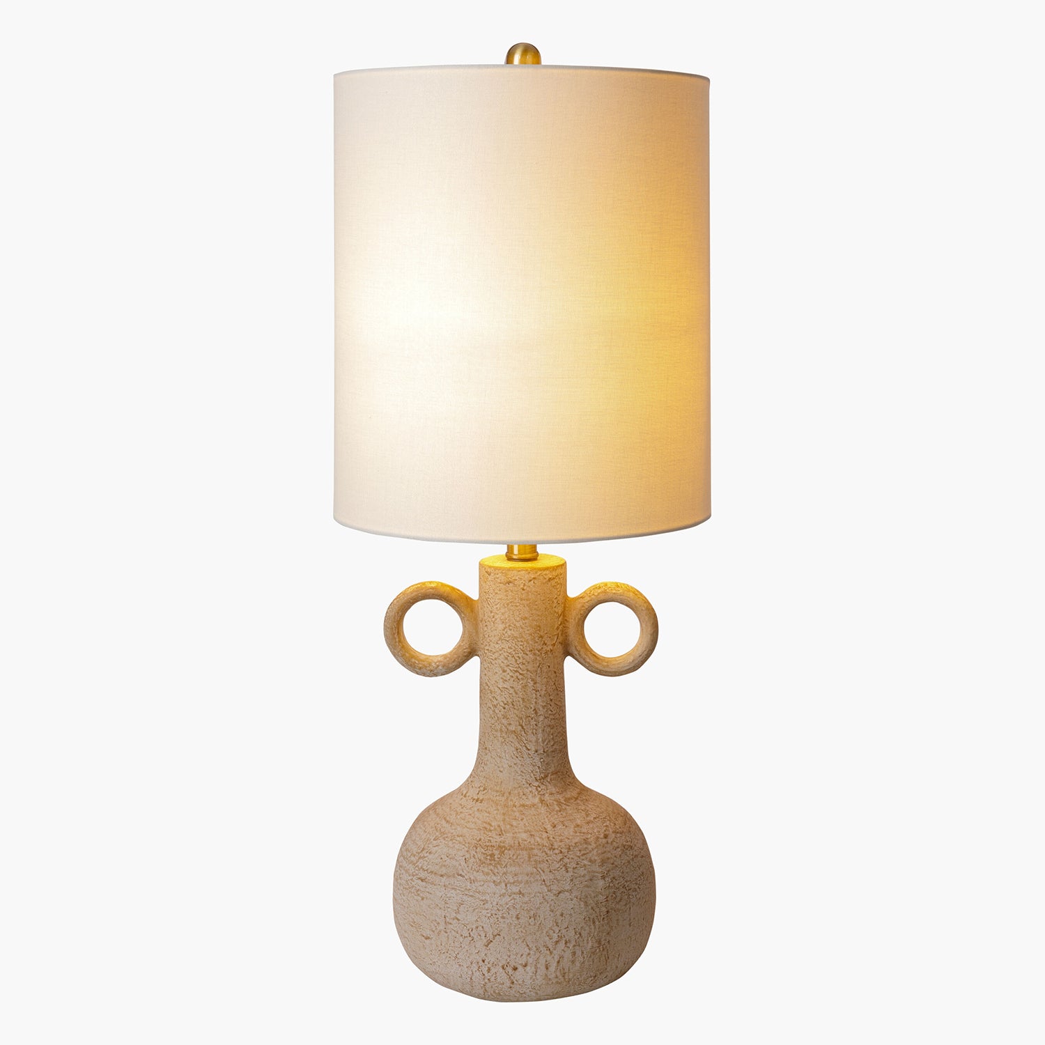 Table lamp with beige ceramic base and white shade on a white background