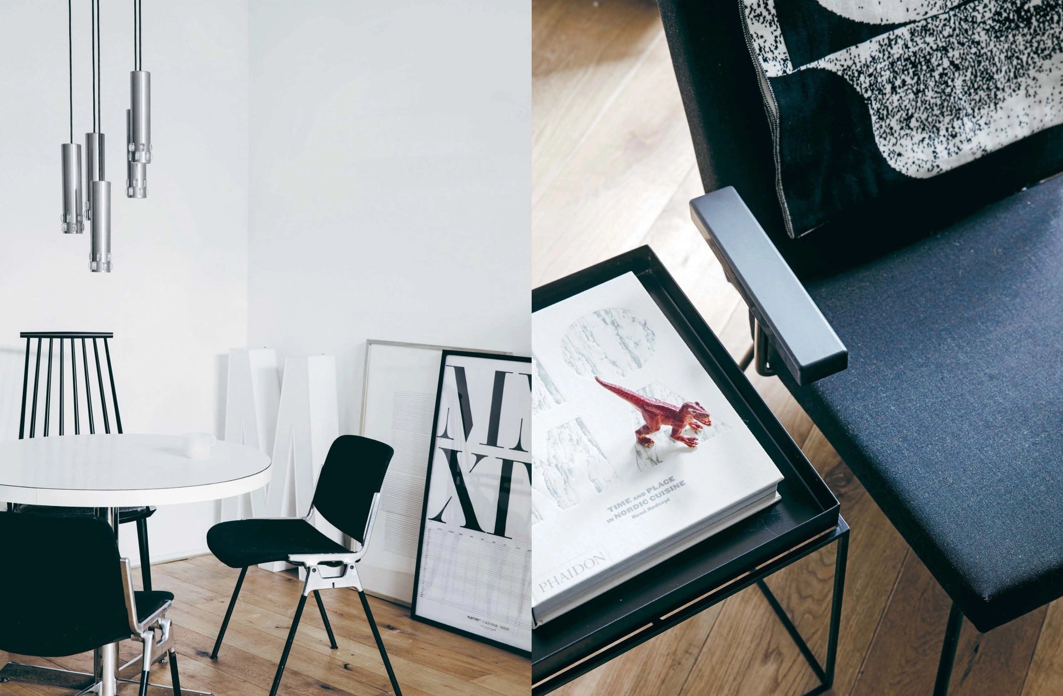 Modern interior with black chairs, a white table, and decorative elements.
