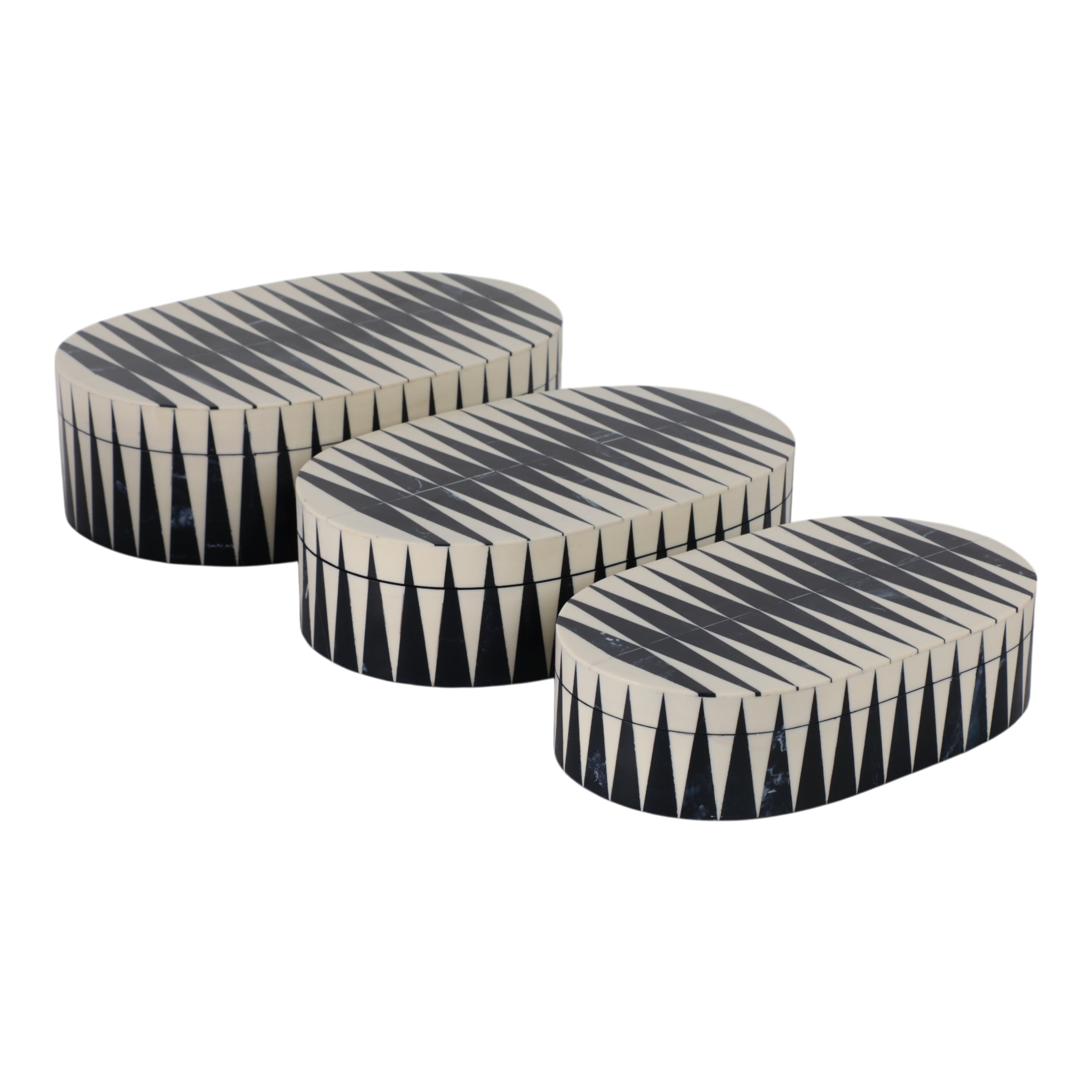 Set of three decorative boxes with black and white striped pattern on a white background