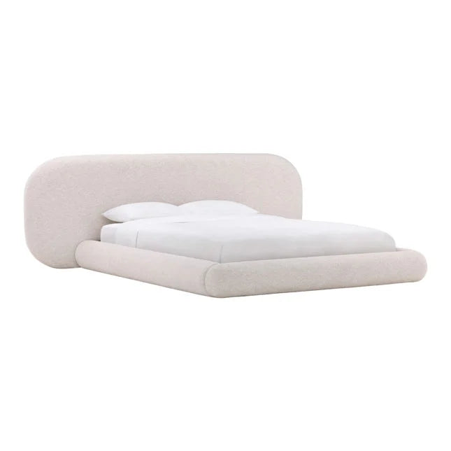 Modern bed with beige headboard and white bedding on a white background