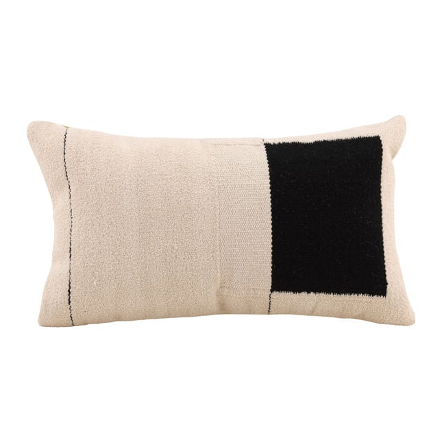 Beige and black rectangular pillow on a white background