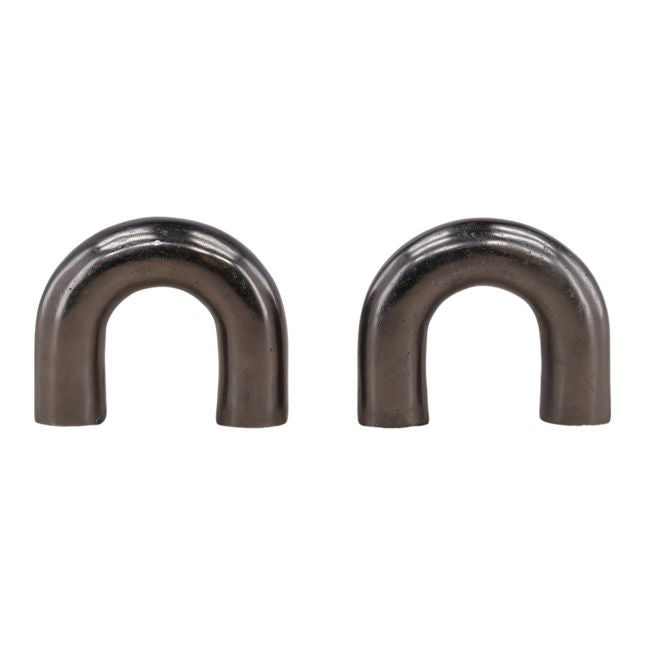 Two metallic U-shaped bookends on a white background
