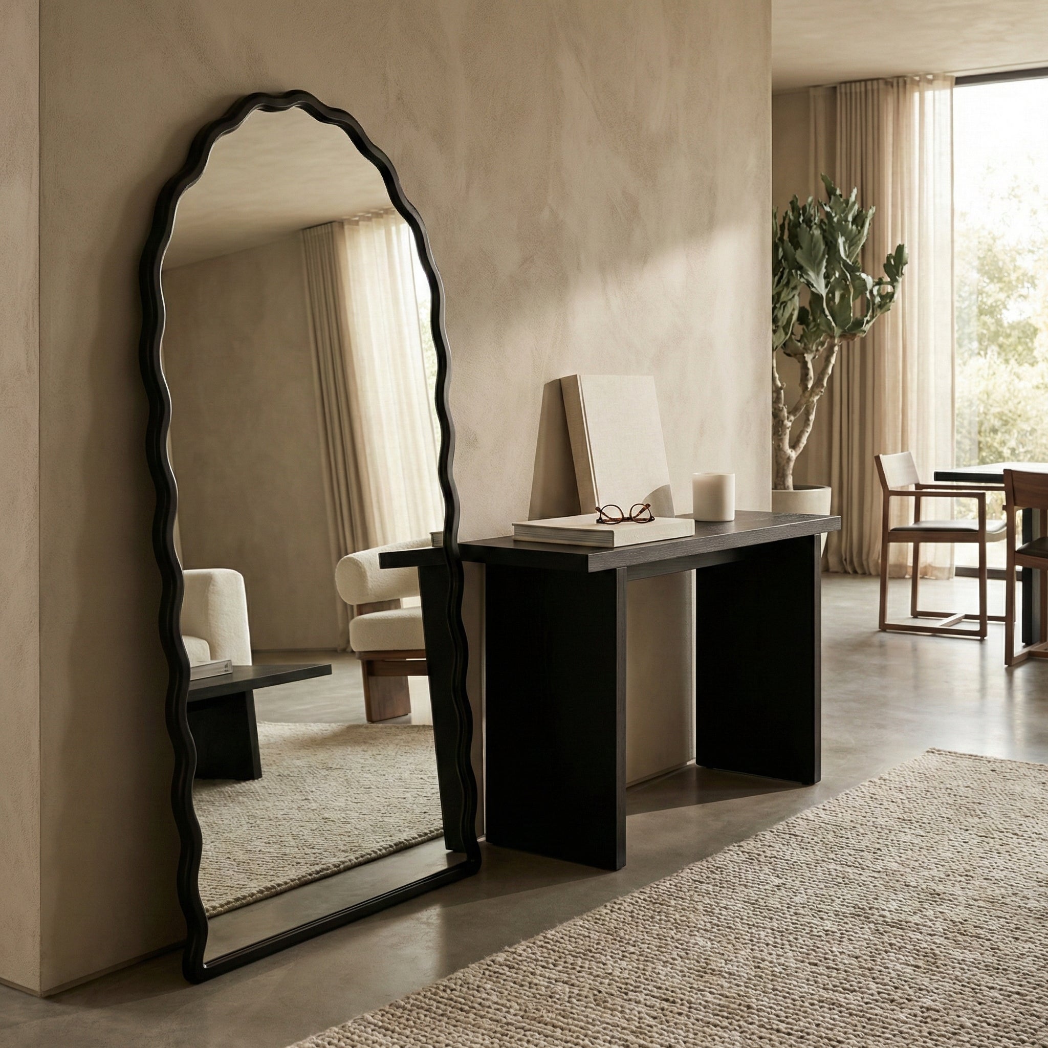 Modern interior with a tall mirror, console table, and decorative items.
