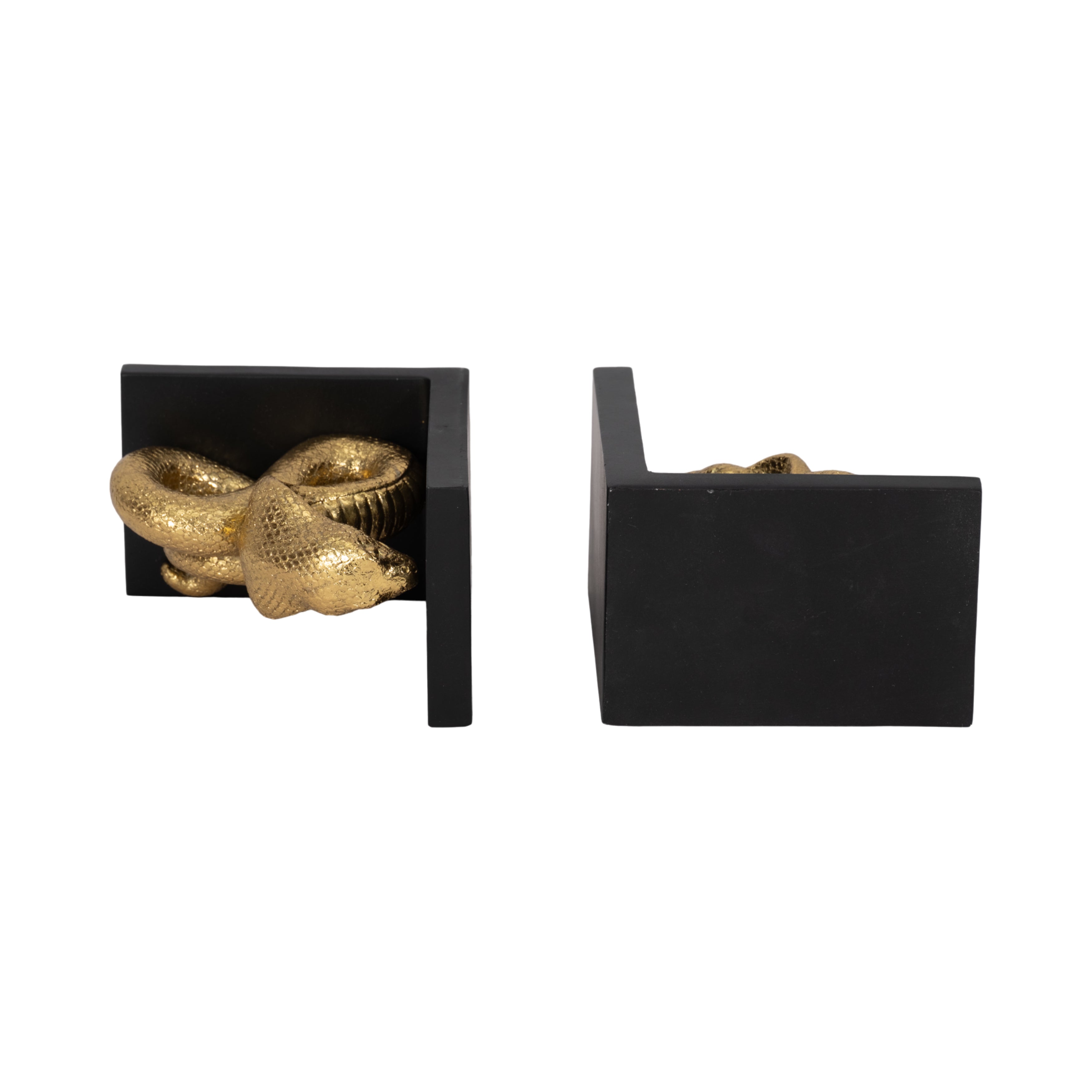 Pair of black and gold decorative items on a white background