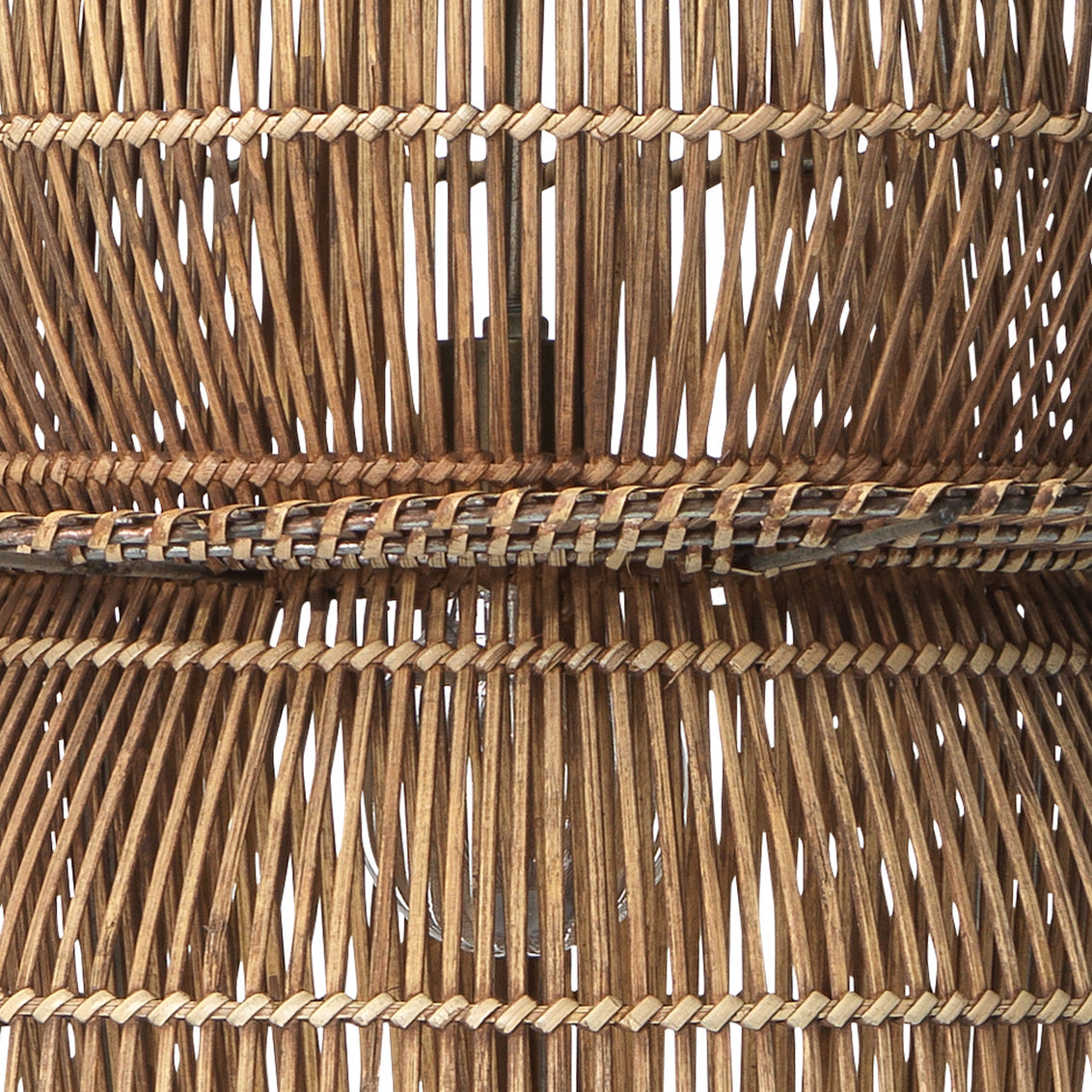 Close-up of a woven wicker basket with a natural brown color.