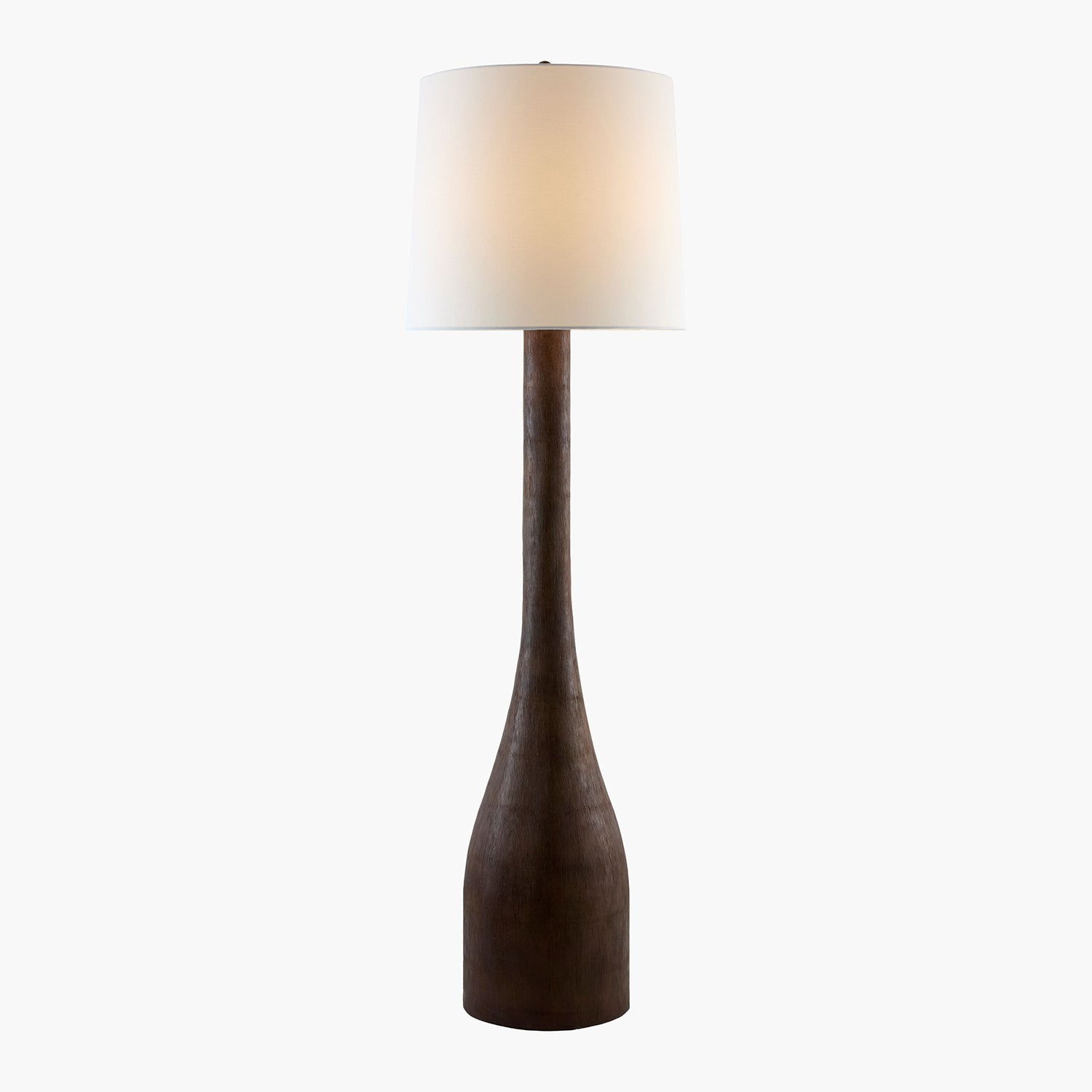 Floor lamp with a dark brown base and white shade on a white background