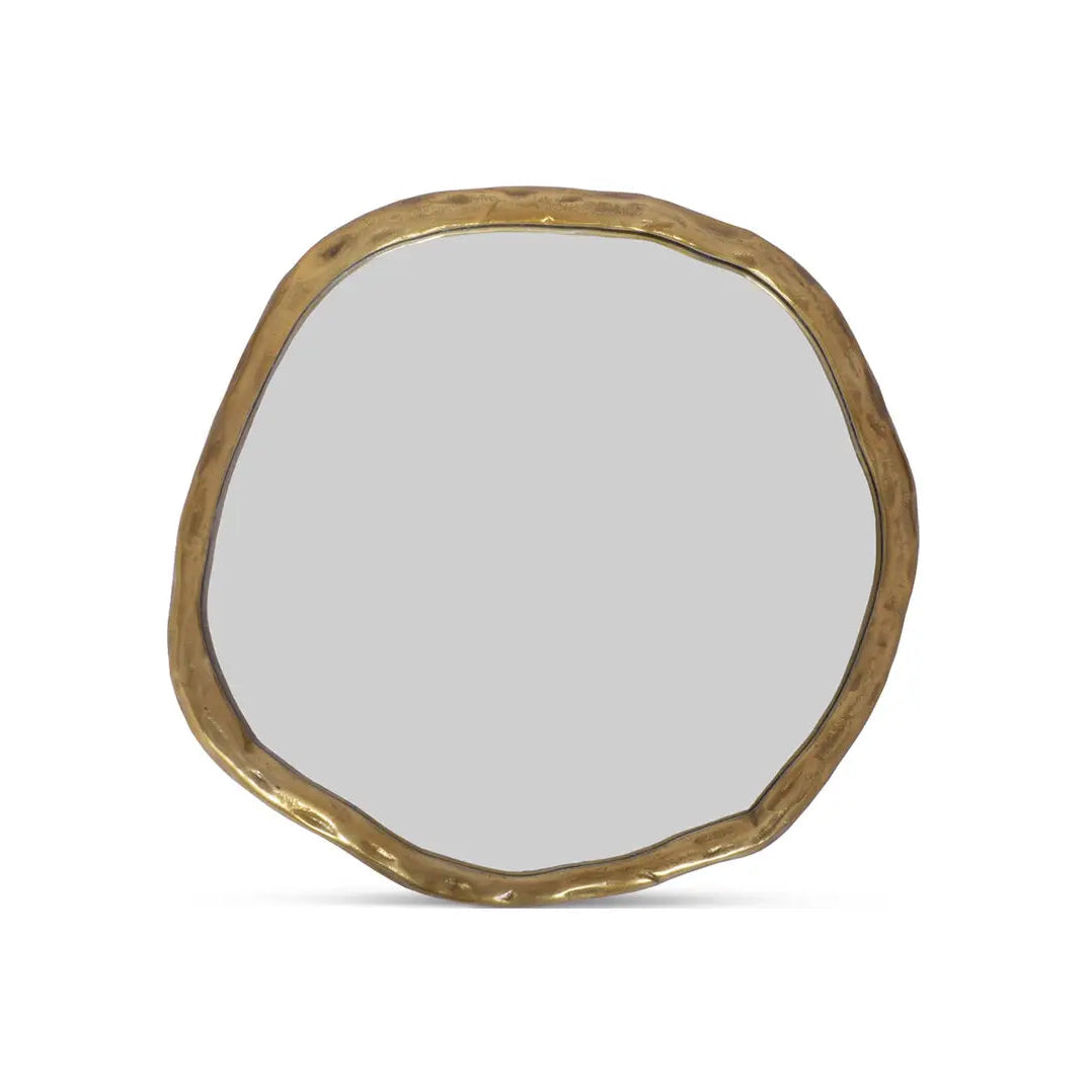 Round mirror with a gold frame on a white background
