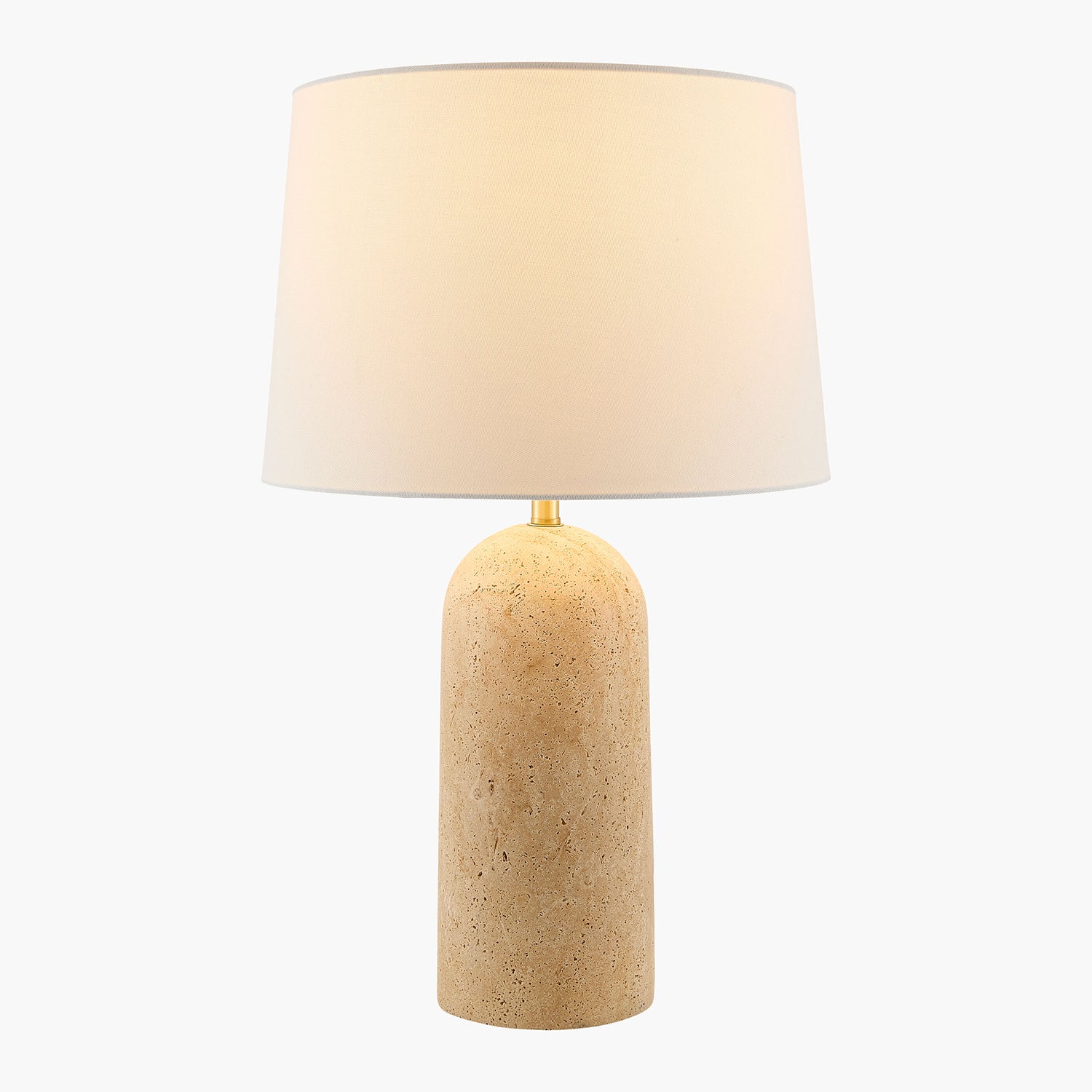 Table lamp with beige travertine base and white shade on a white background