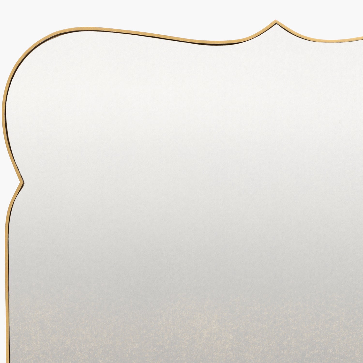 Mirror with a gold frame on a white background
