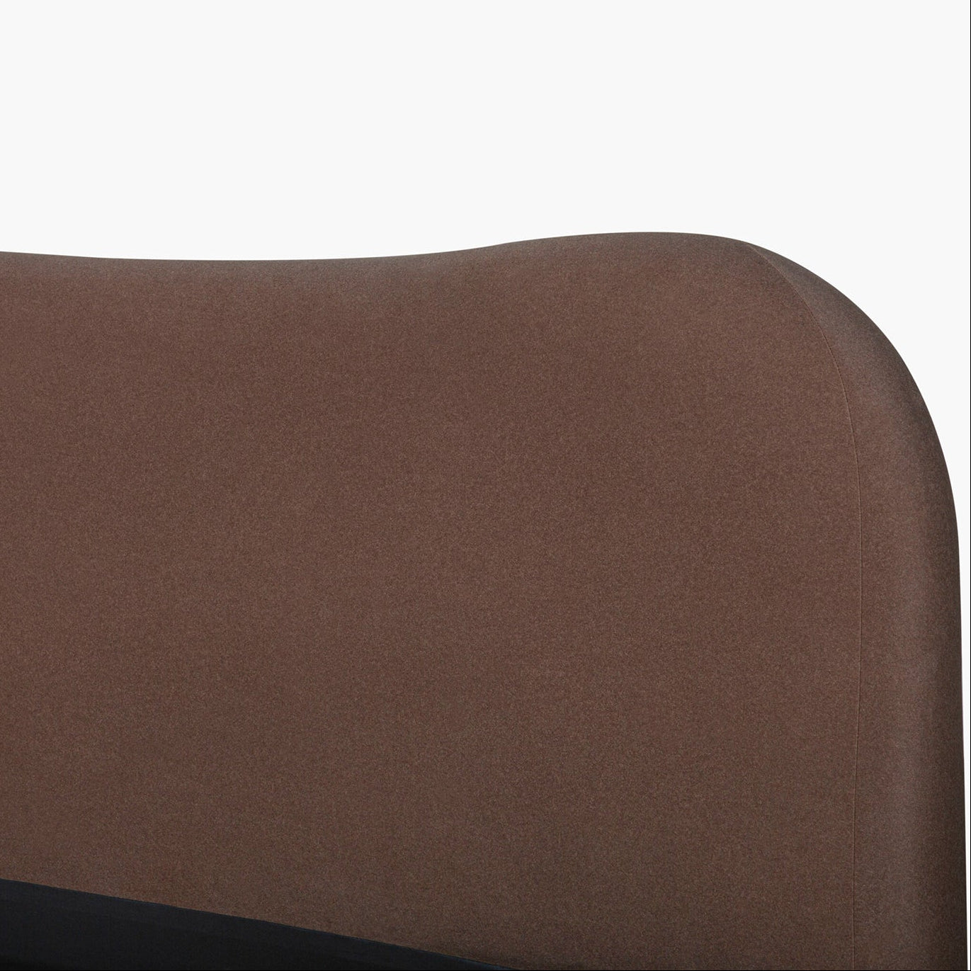 Brown upholsteredheadboard on a white background