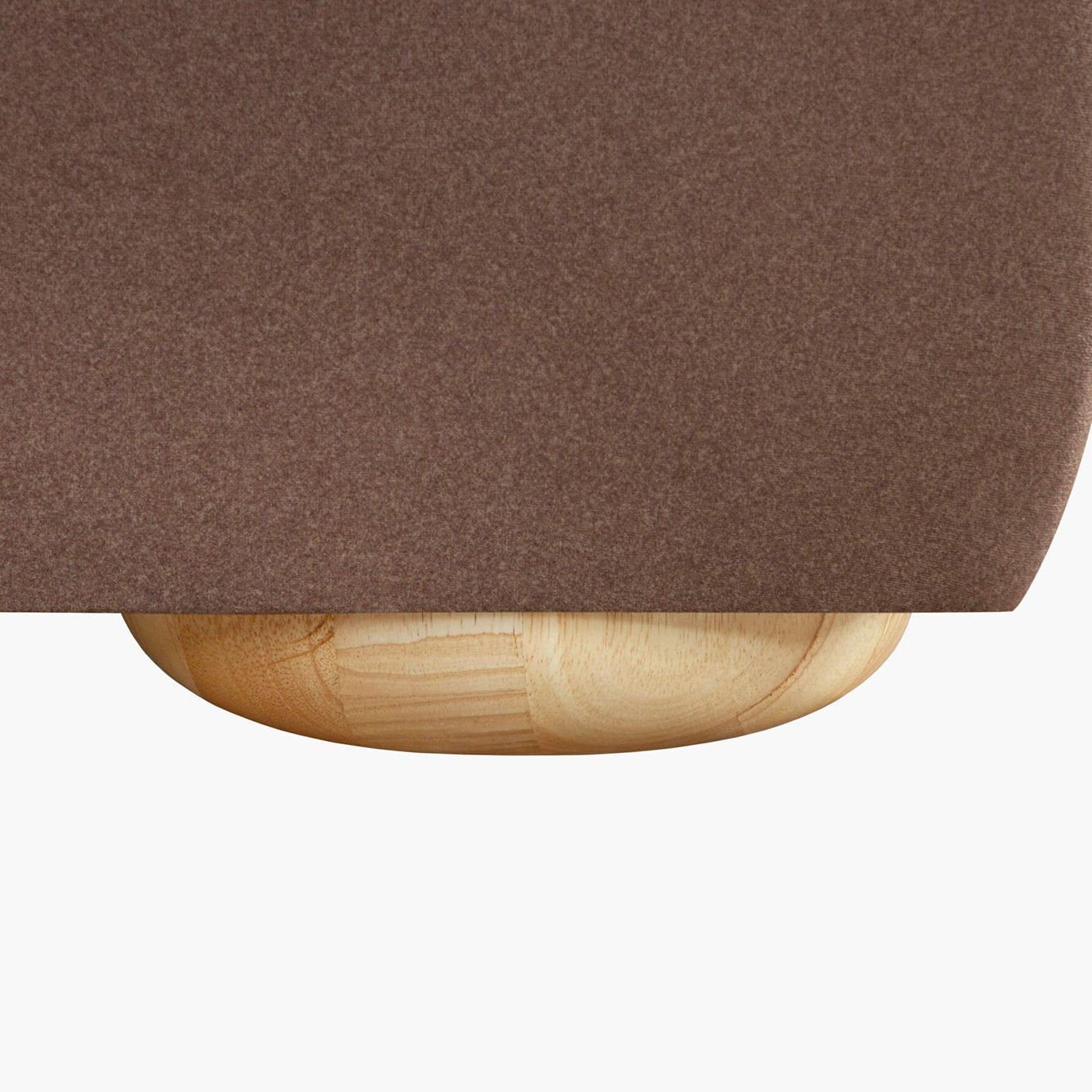 Brown upholstered footboard with a wooden base on a white background