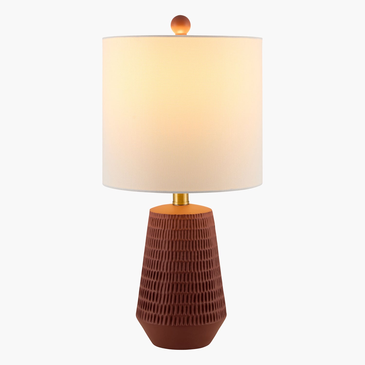 Table lamp with a textured brown base and beige shade on a white background