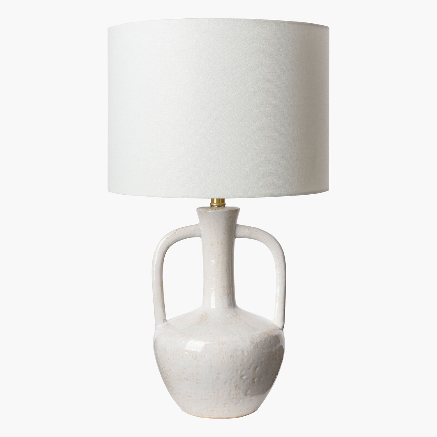White ceramic lamp with a white shade on a white background